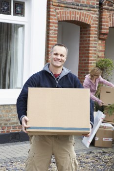 Person using self storage in Soho for boxes and household items