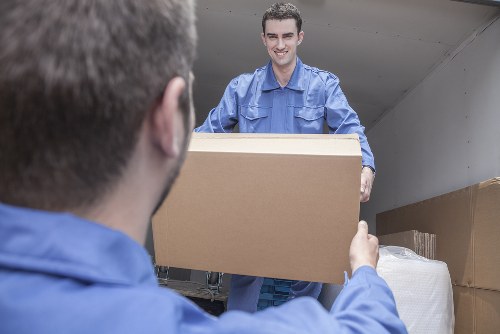 Customer moving storage items in a safe and orderly self storage environment