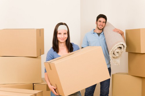 Packed boxes and furniture ready for a local Soho home removal
